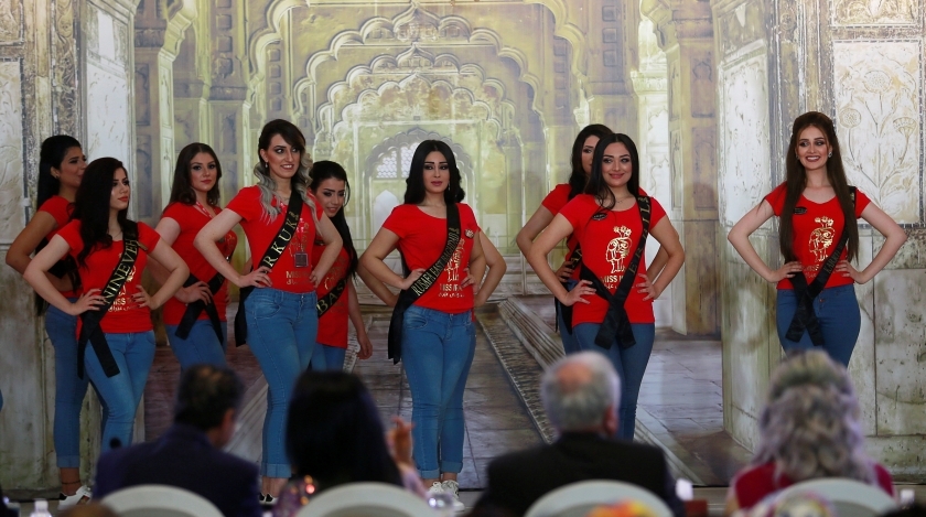 Participants wait for judges to determine the winner of Miss Iraq during the final round of judging in Baghdad, Iraq, May 25, 2017. (Photo: Reuters)